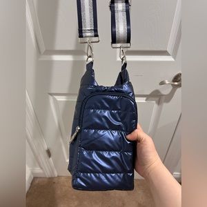 Shiny blue quilted crossbody bag